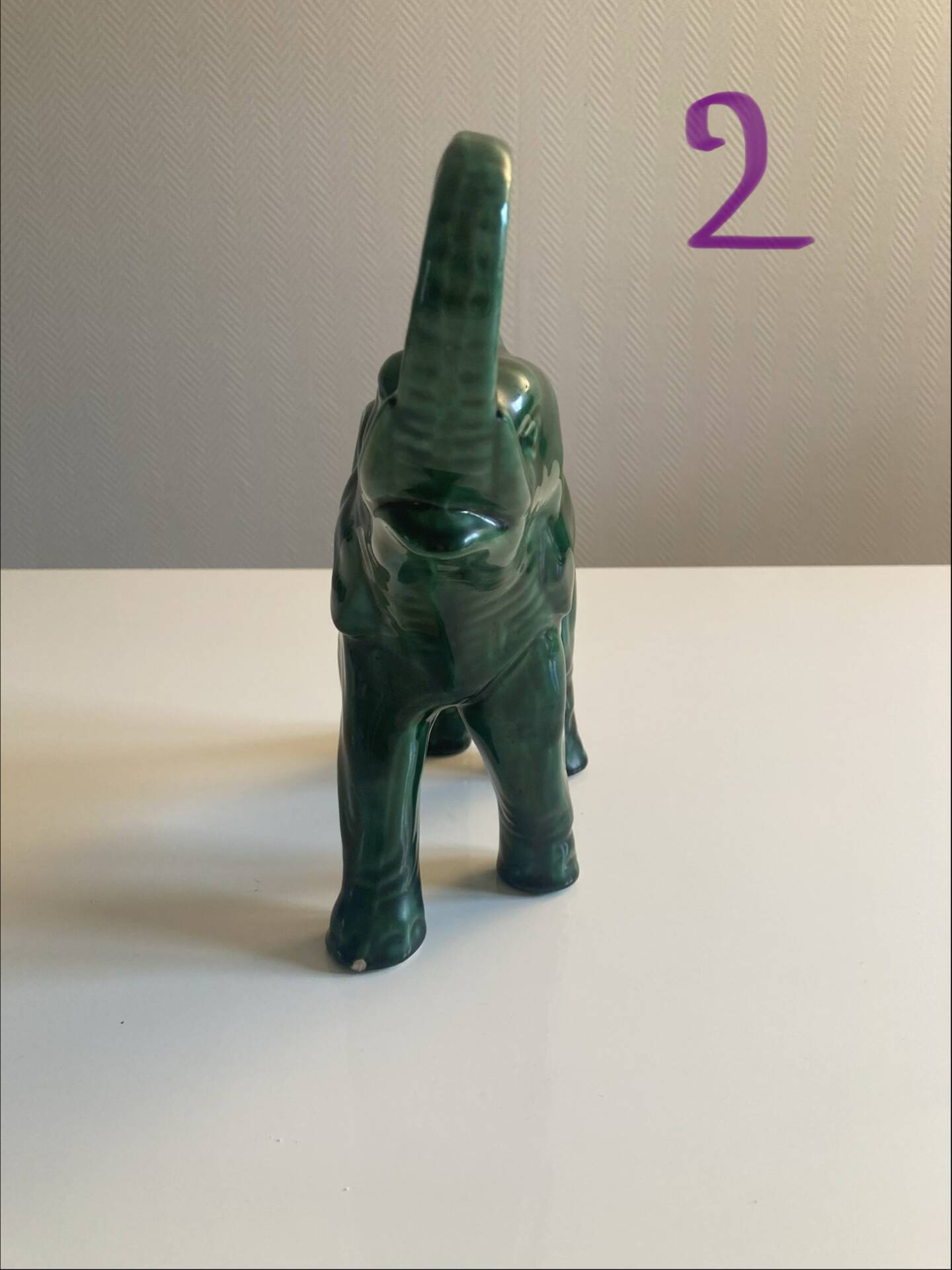 Pair of marbled faience elephants from Saint Clément
