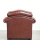 Brown cow leather Chesterfield armchair in a unique design