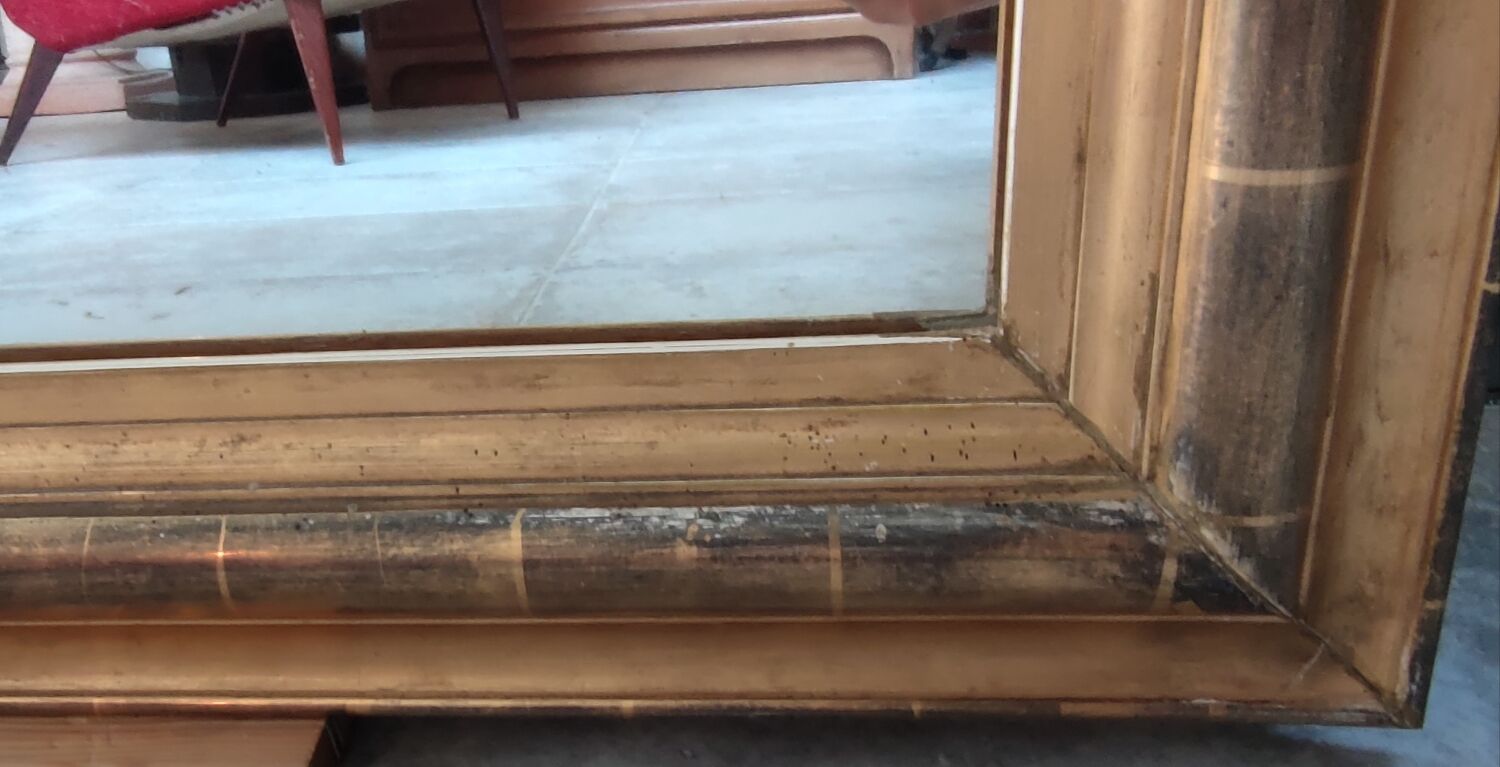 Old large gilded mirror