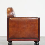 Cognac-colored sheepskin Art Deco design armchair in good condition
