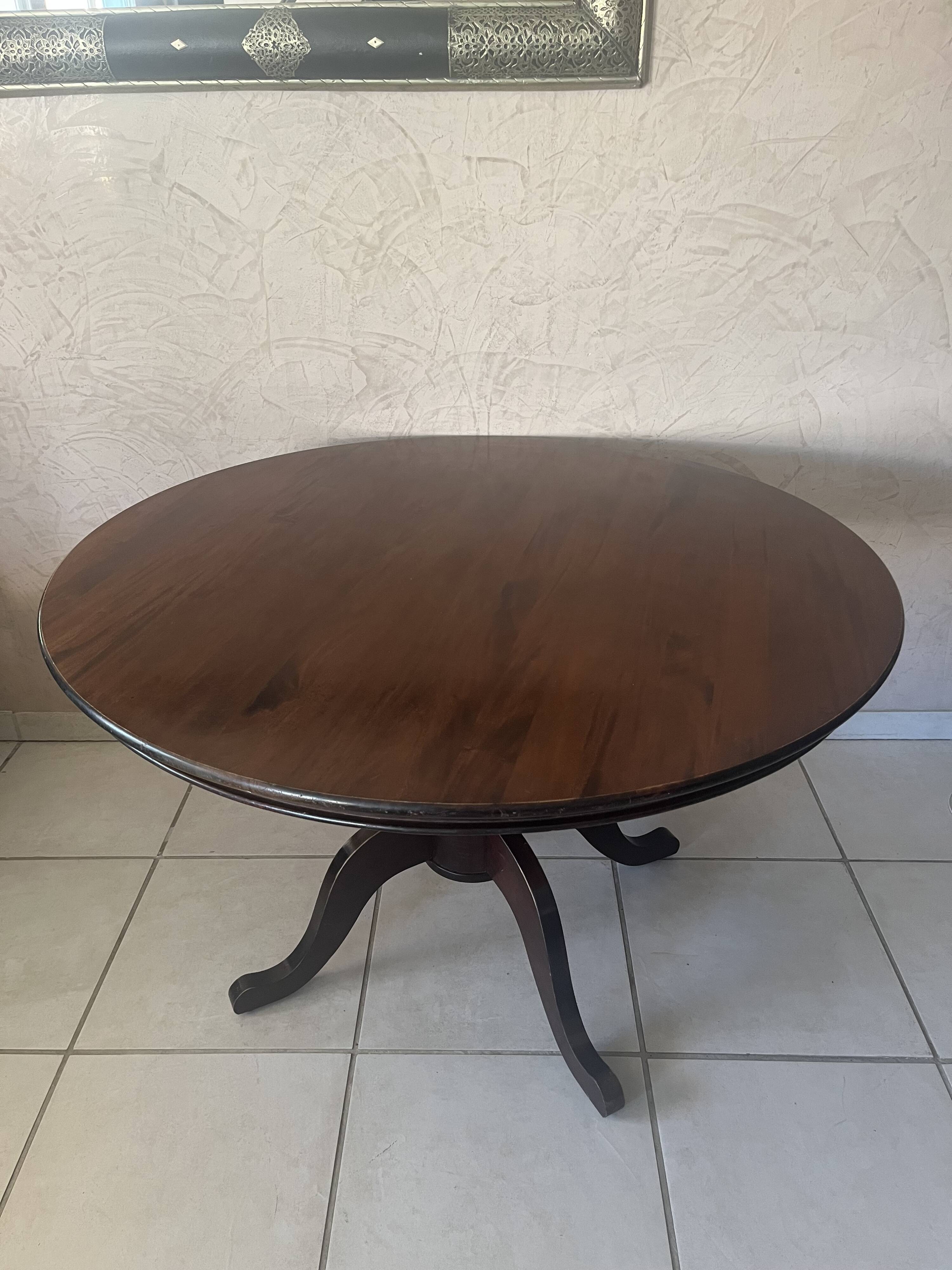 Round solid wood table