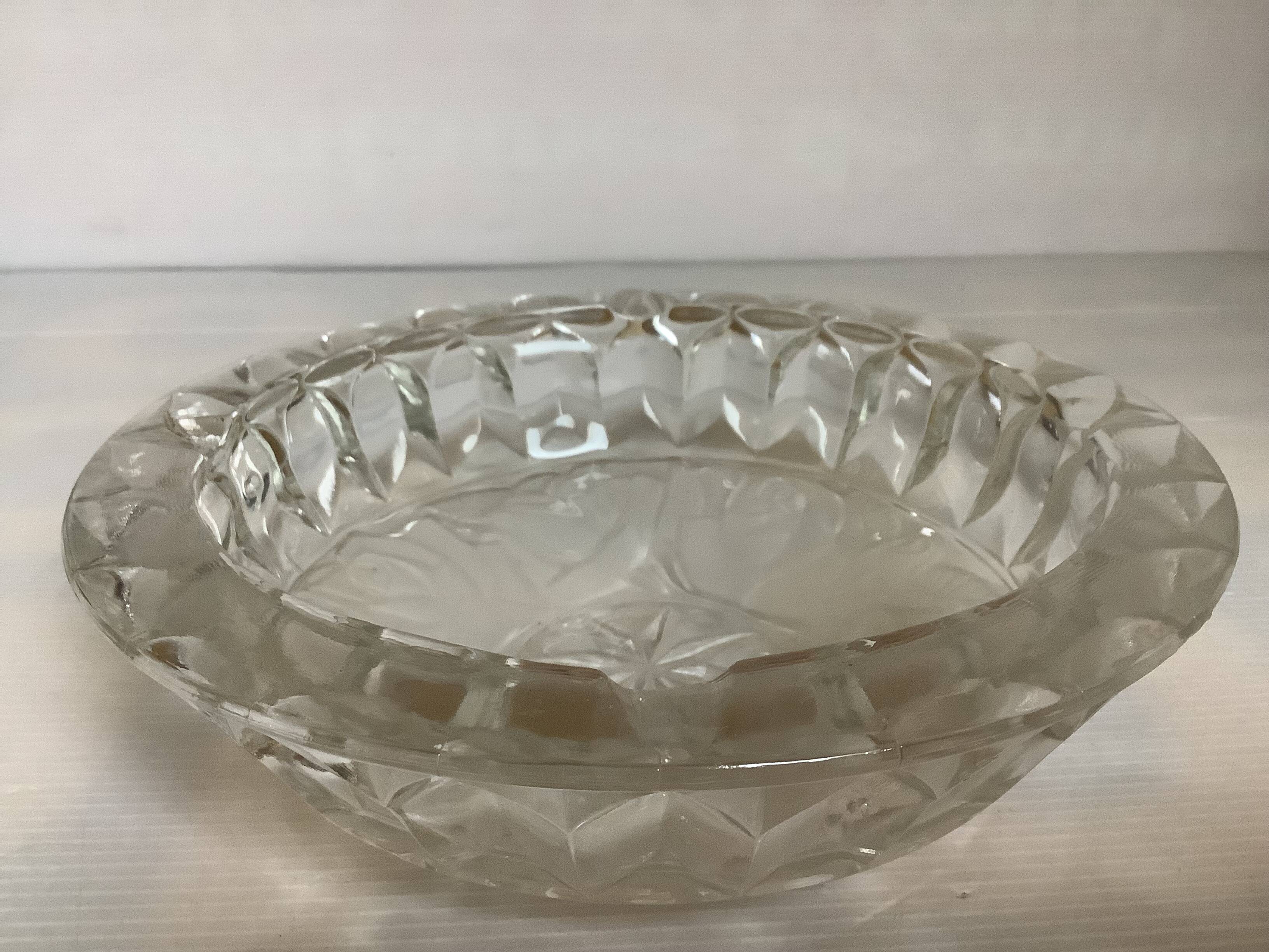 Large glass ashtray with frosted flowers.