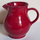 Vintage red enamel ceramic pitcher
