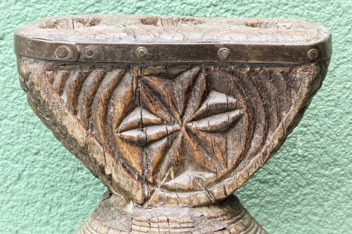 Brutalist candlestick, antique Asian grain sorter in carved wood.