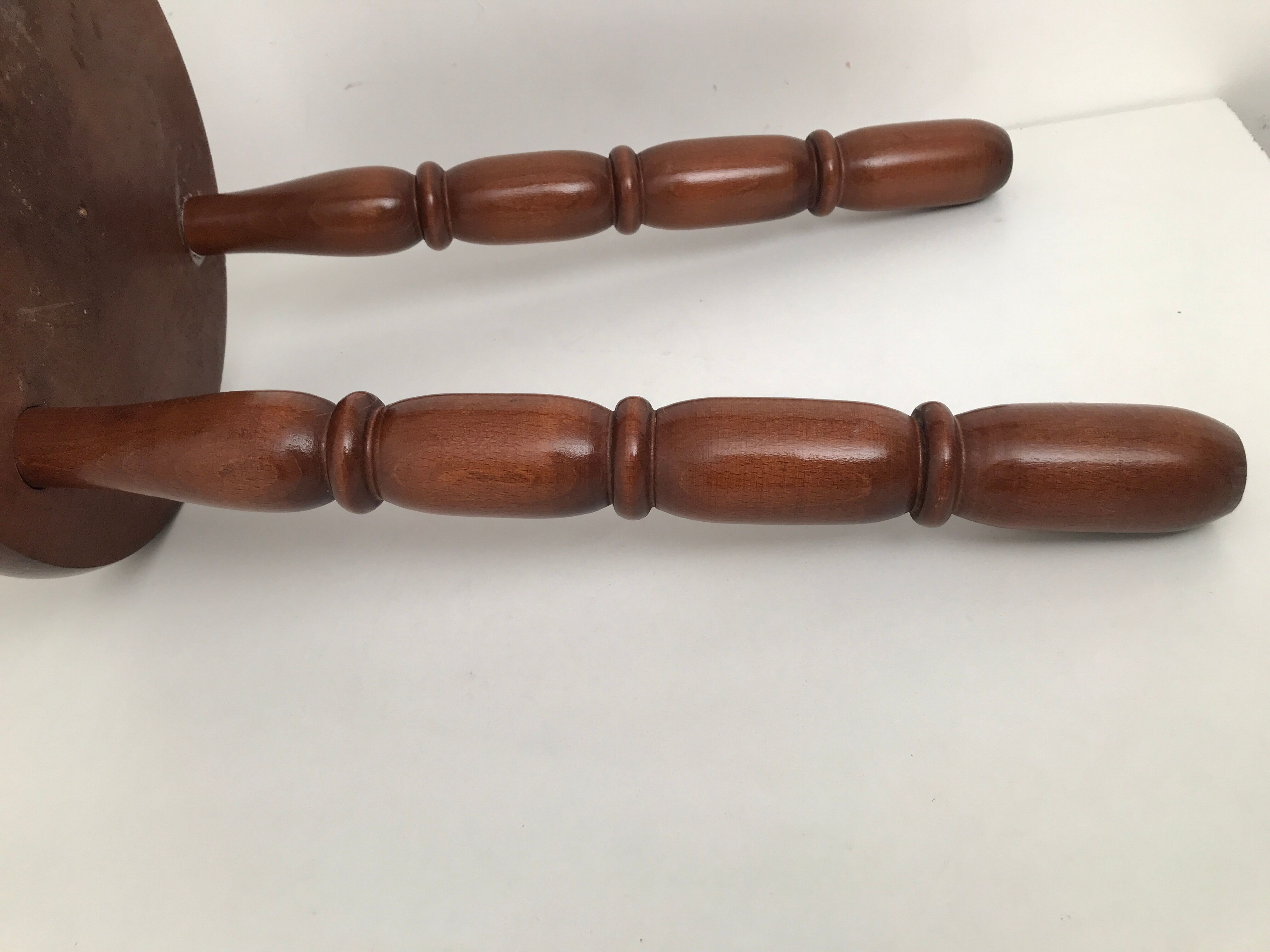 Wooden stool turned tripod foot