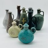 Set of nine modern sculptural ceramic vases from the mid-century, Bauhaus influence.