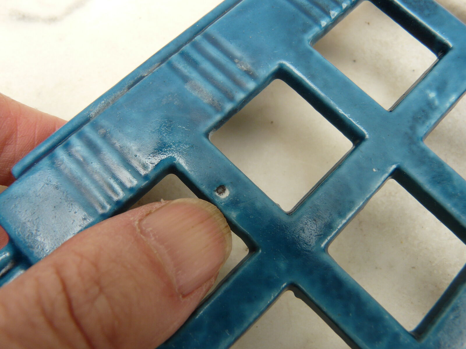 Art deco enamelled table mat