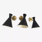 Set of three Italian wall lights in brass and lacquered iron, 1950s design.