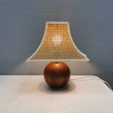 Very rare table lamp in turned teak wood with original braided shade. 1970s