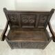 Chest bench in natural wood carved with Gothic motifs