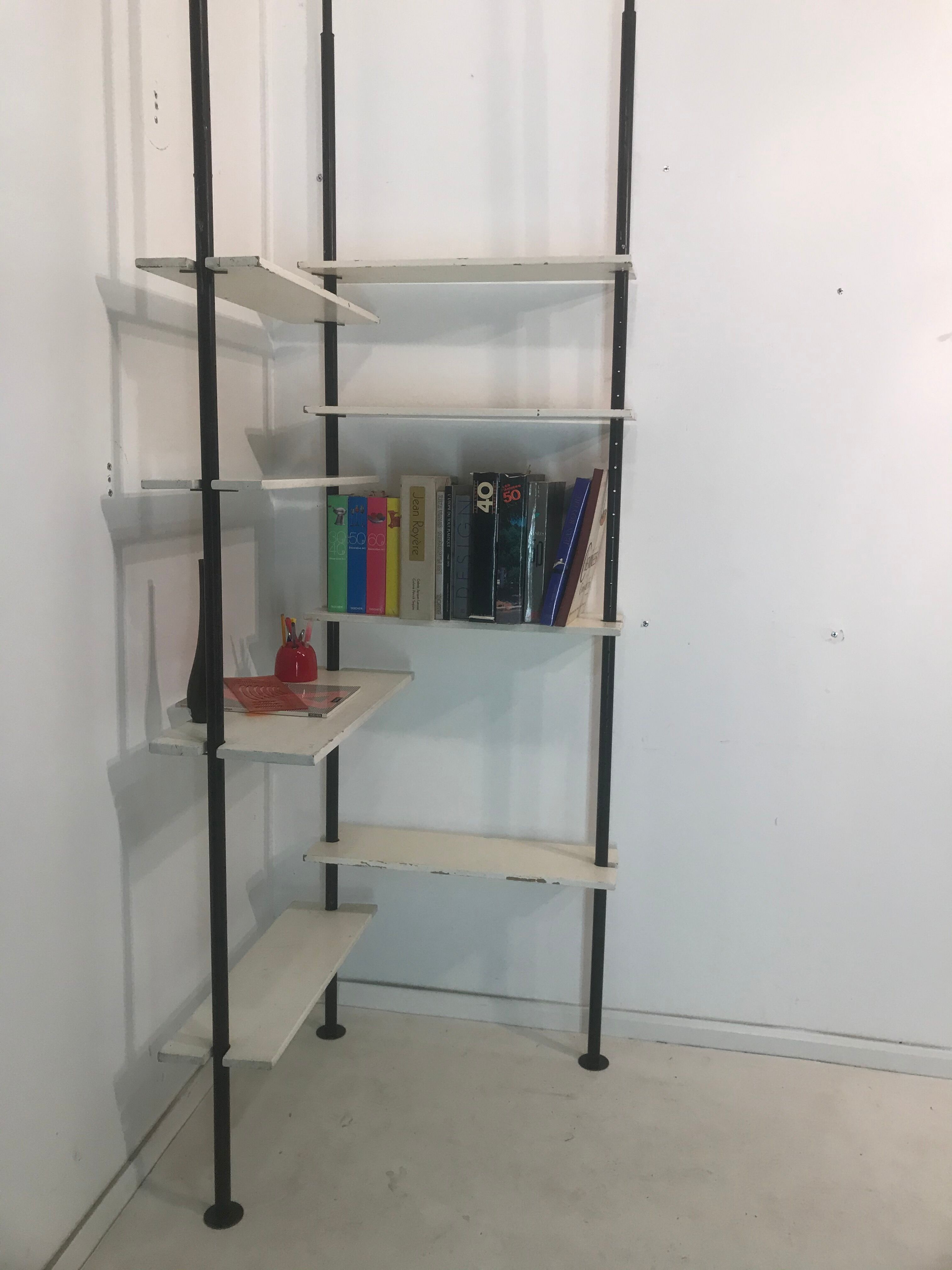 3-mounted floor/ceiling library