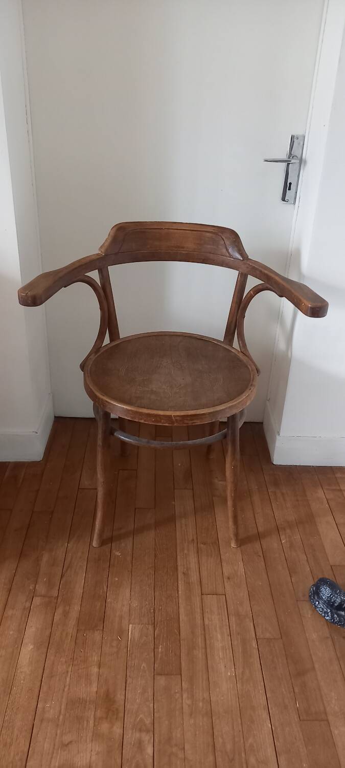 Curved wood armchair