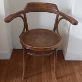 Curved wood armchair