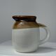 Small two-tone white and brown pitcher Made in China
