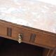 Old pink marble bedside