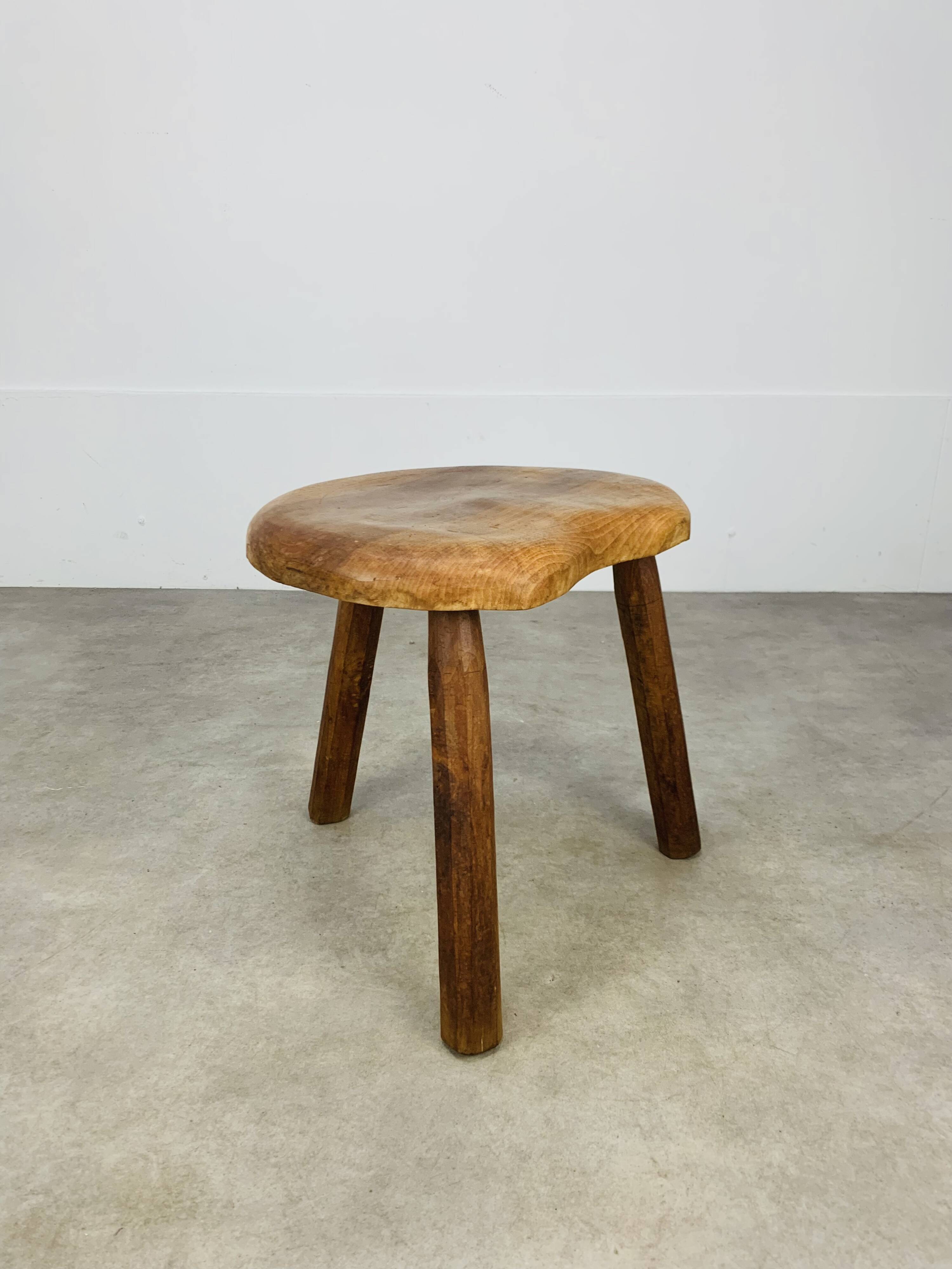 Brutalist tripod stool in solid wood