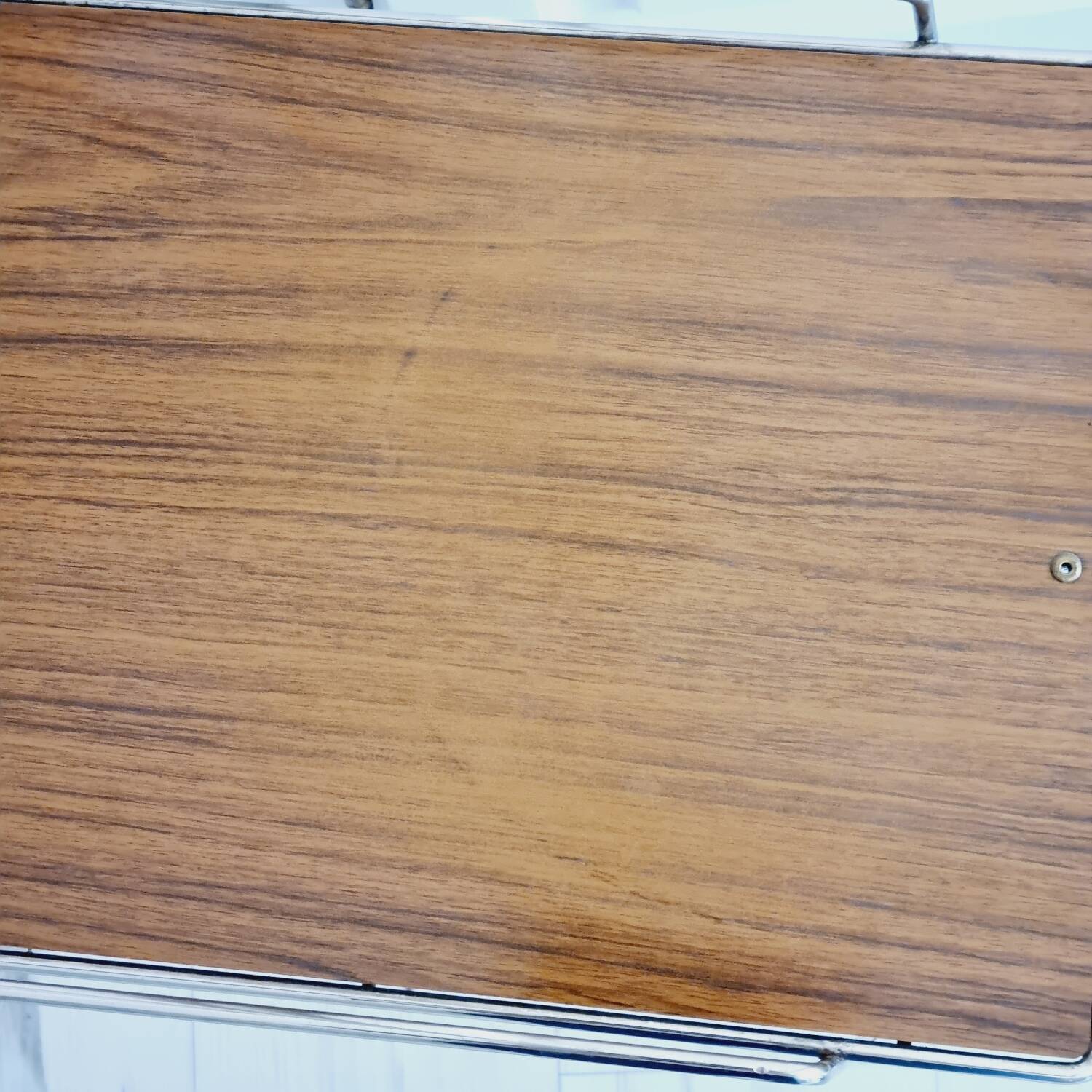 Metal and Formica magazine rack side table