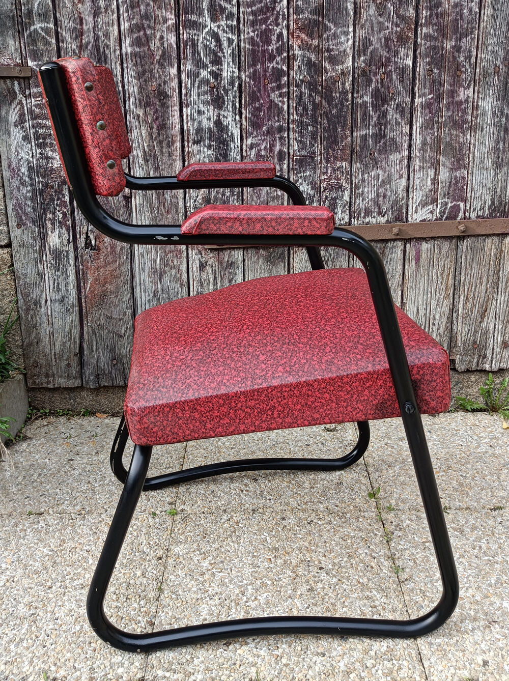 Design armchair, metal and red skai, vintage, 50s