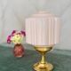 Art Deco lamp from the 1930s with an opaline globe featuring a pink flower.