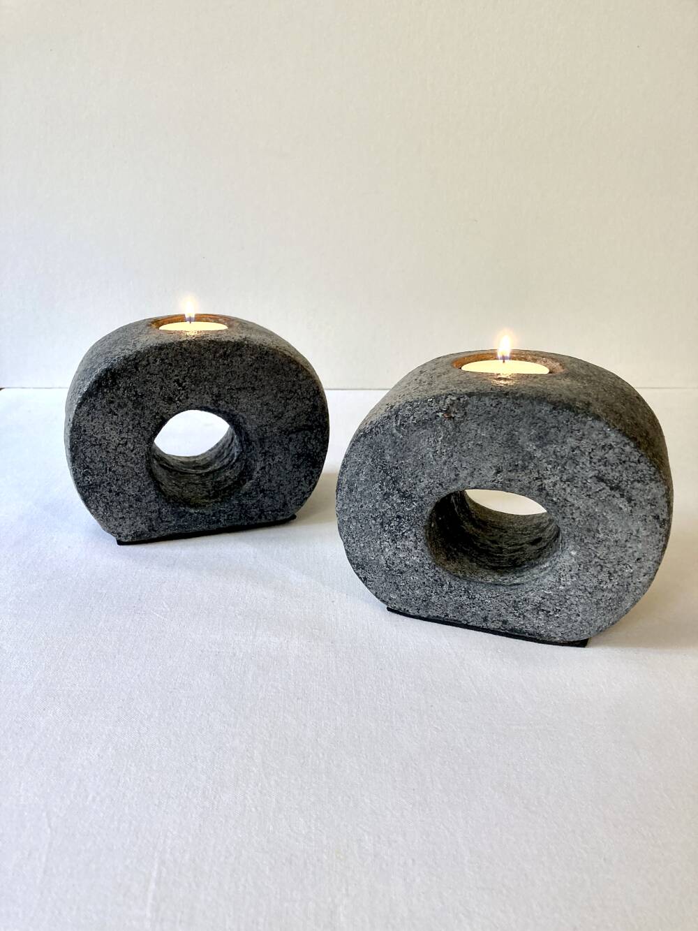 Pair of terracotta candle holders with anthracite finish, 1980s.