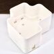 Vastill planter in white plastic by Michael McCann
