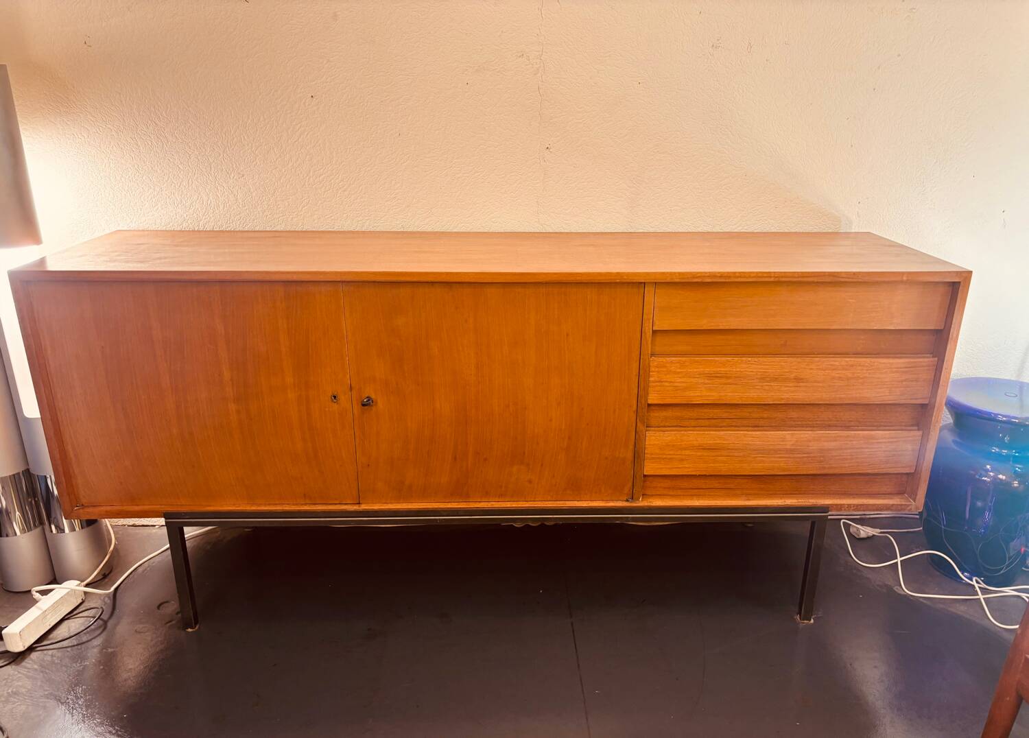 Scandinavian sideboard with 2 doors and 3 drawers in teak.