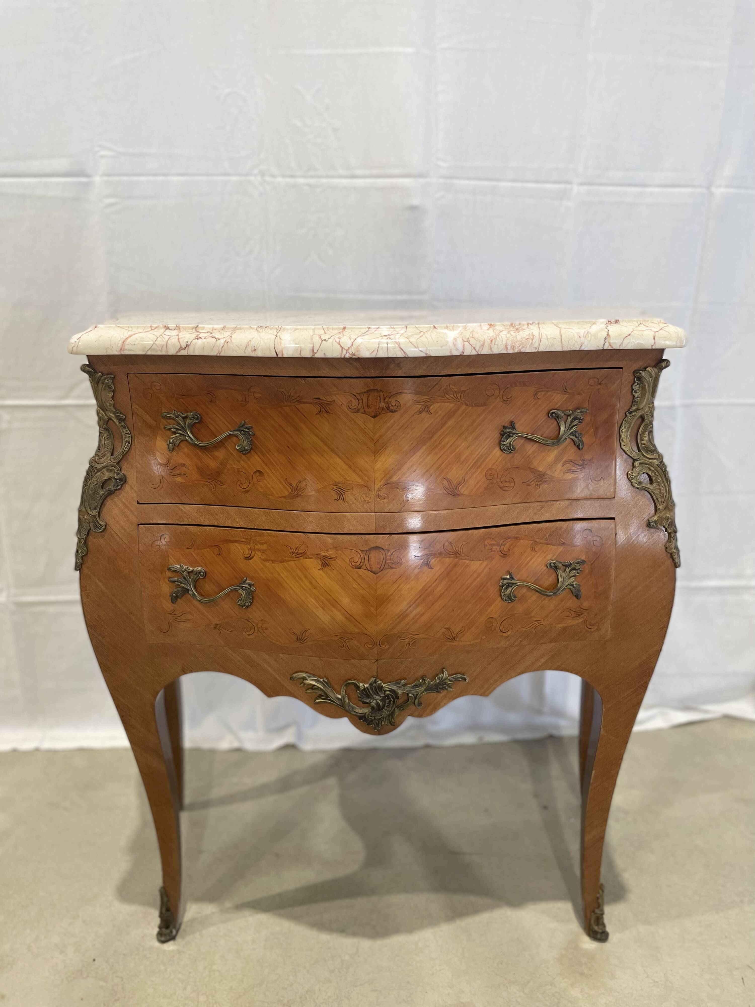 Old curved chest of drawers inlaid and marble Louis XV style