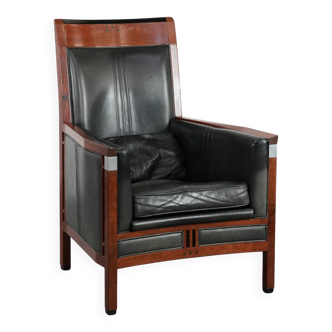 Black Art Deco cowhide leather and wooden design armchair with a high back
