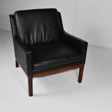 Leather and rosewood armchair by Kai lyngfeldt-Larsen. Denmark