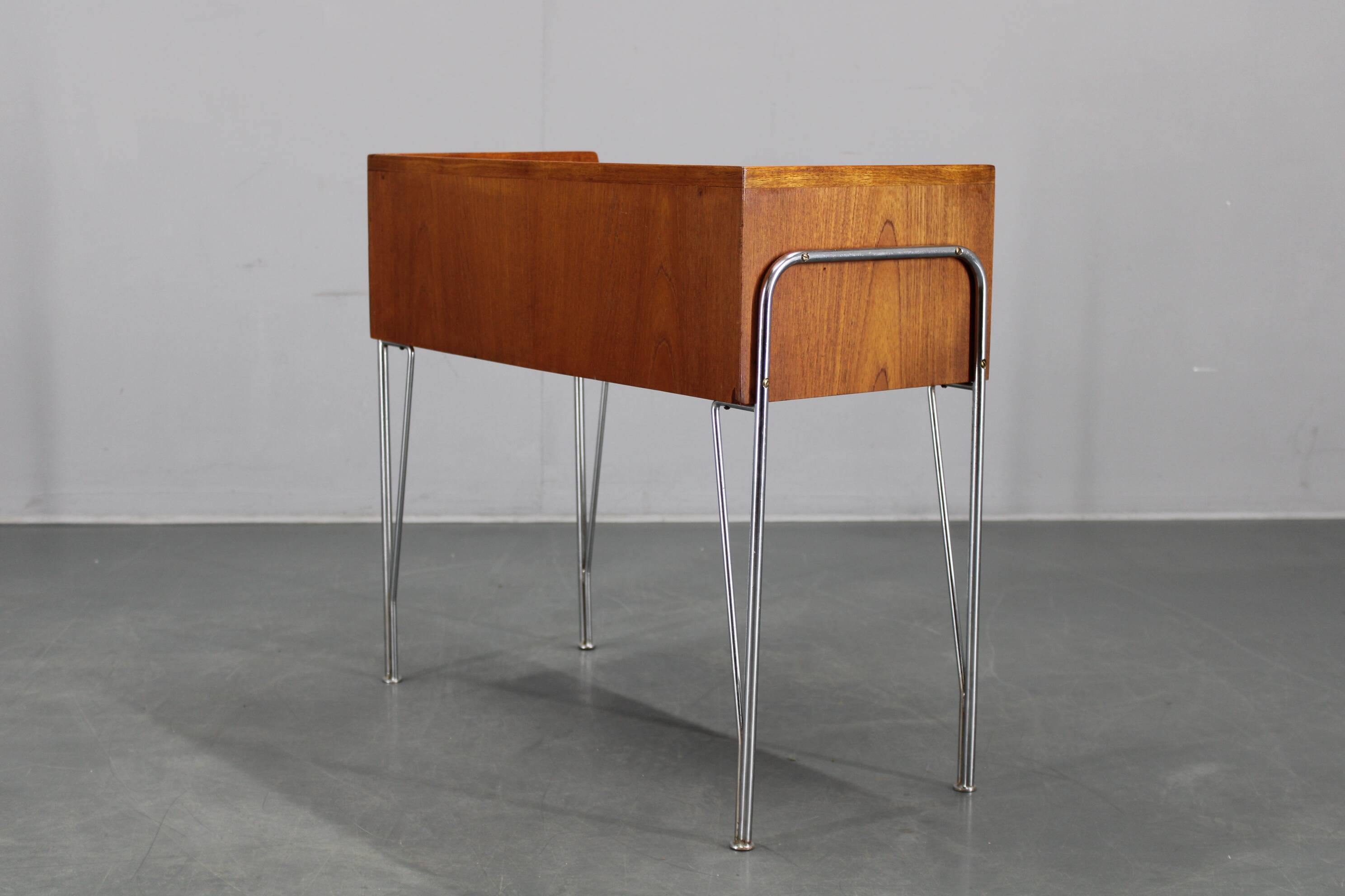 1960s Danish teak shelf cabinet with chrome plated legs