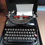 Remington portable typewriter from the 1930s and safe