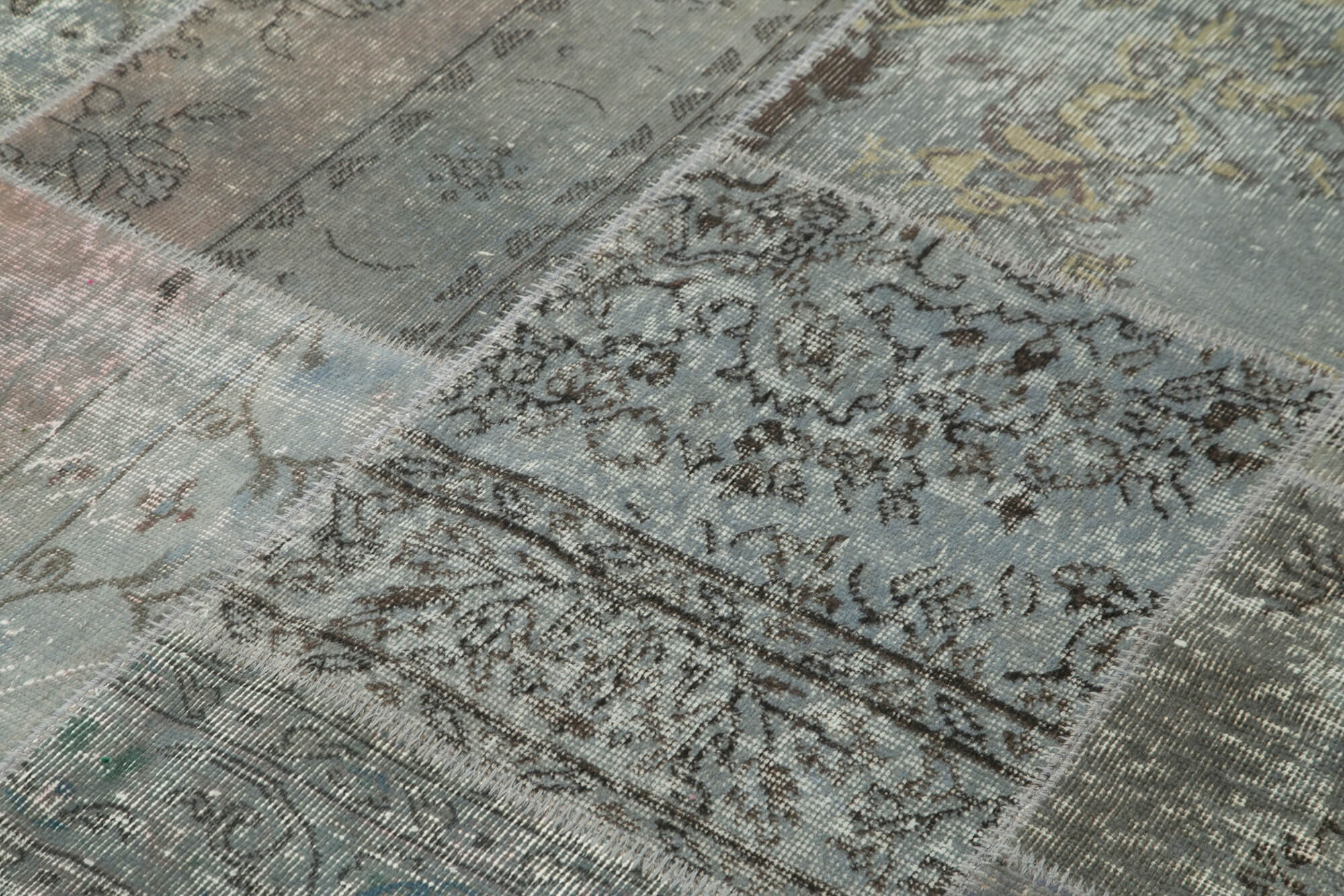 Hand-knotted turkish vintage 172 cm x 245 cm grey patchwork carpet