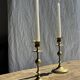 Pair of gilded candlesticks with engraved flower garland motifs H22