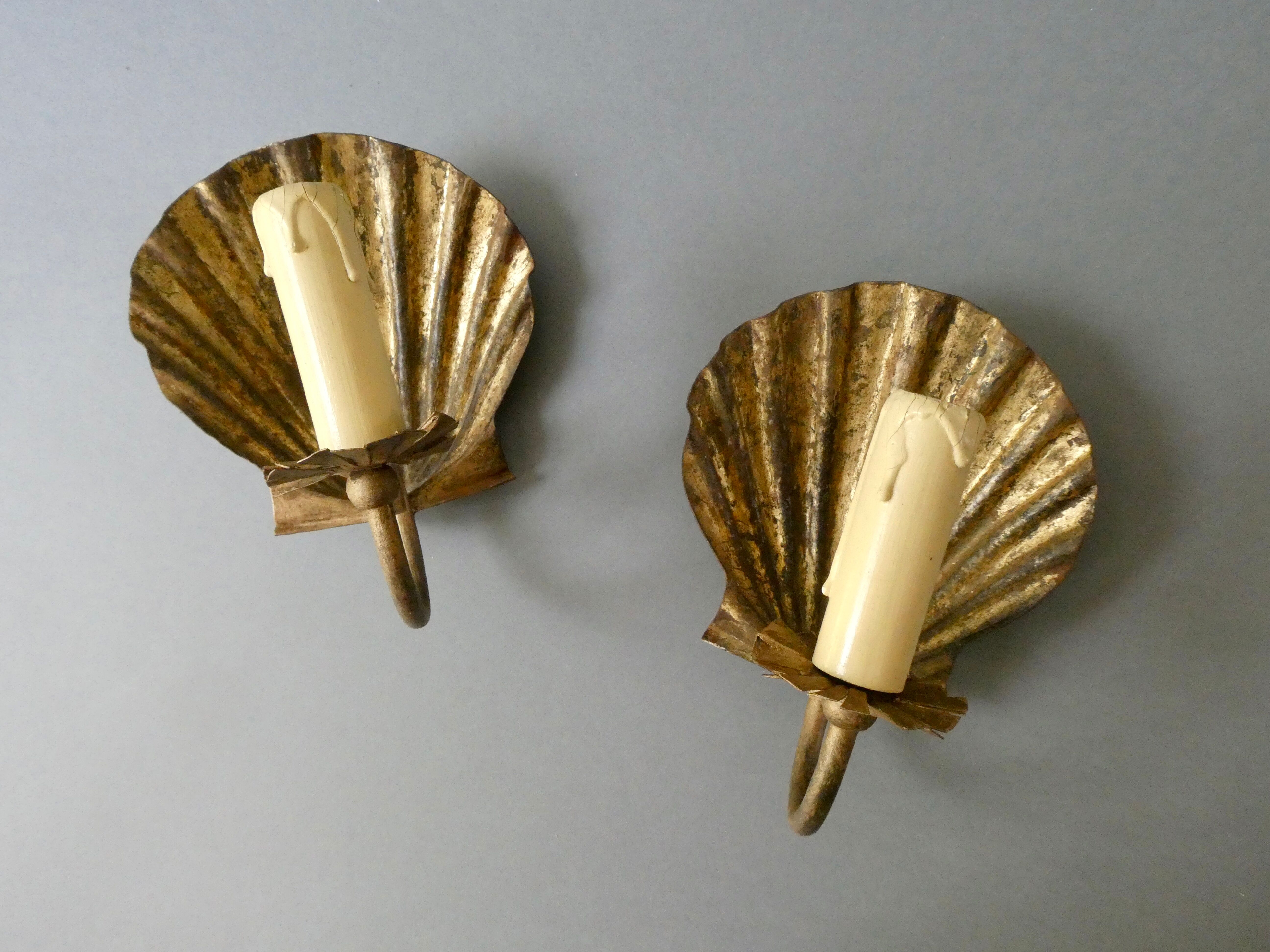 Pair of golden metal shell sconces