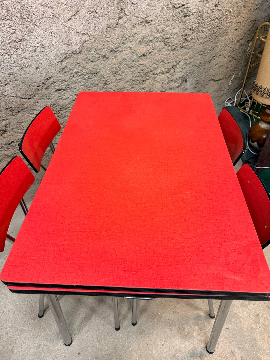 4 red Formica chairs with a 1970s table