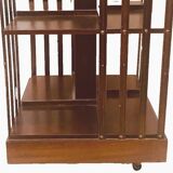 Mahogany revolving bookcase with inlaid top 20th century