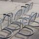 4 chairs & 2 armchairs in chrome-plated steel wire by Gastone Rinaldi, Italy 1970s
