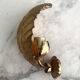 Gold metal leaf wall light