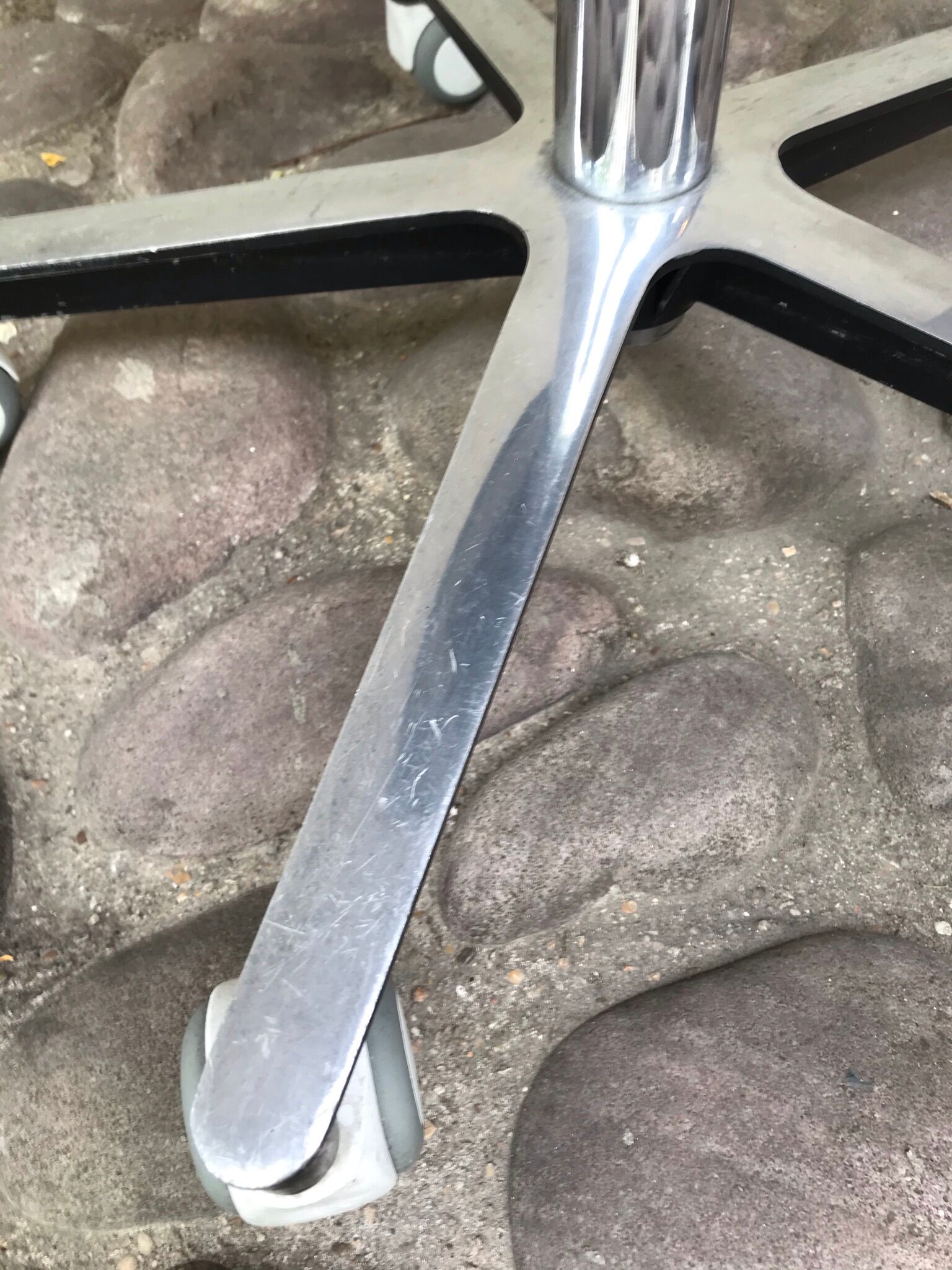 Stool on metal stand in star on wheels sitting round padded skaï bluish