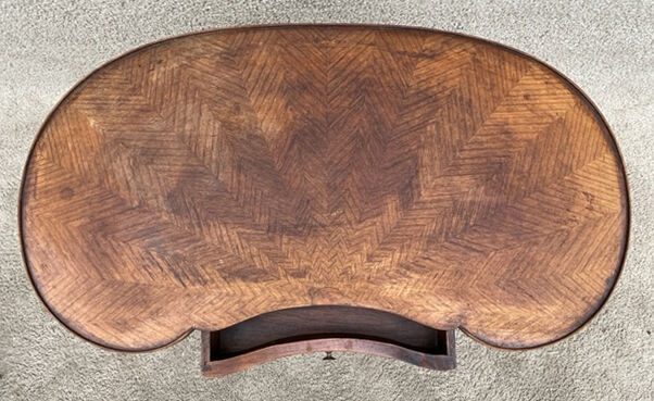 Kidney pedestal table