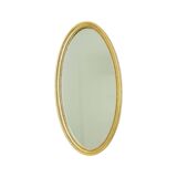 Miroir ovale doré de style Hollywood Regency