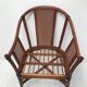 Rattan armchair with its footrest 70s