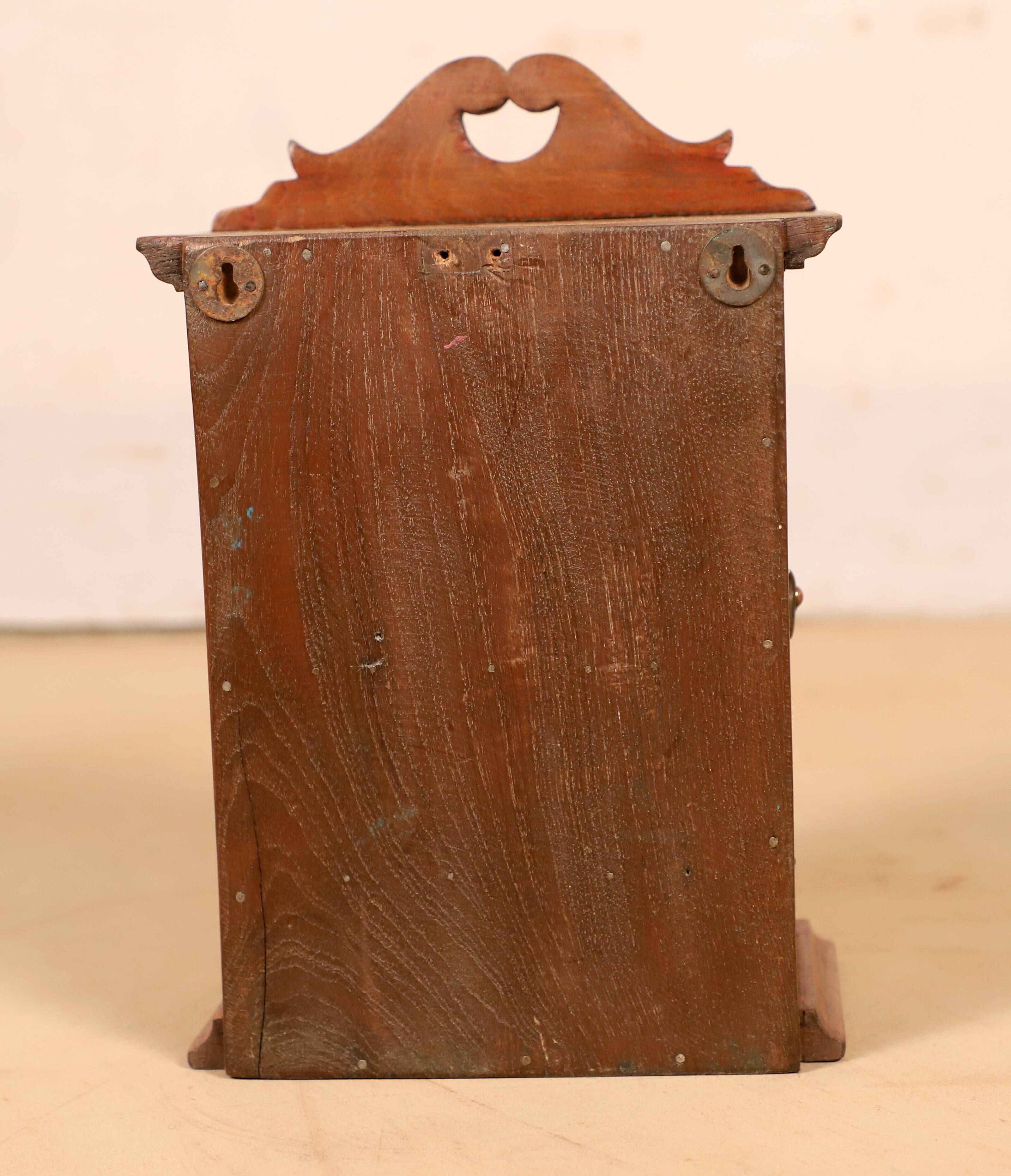 Wall display case - old art deco clock box in burmese teak