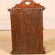 Wall display case - old art deco clock box in burmese teak