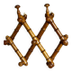 19th century turned wood accordion coat rack.