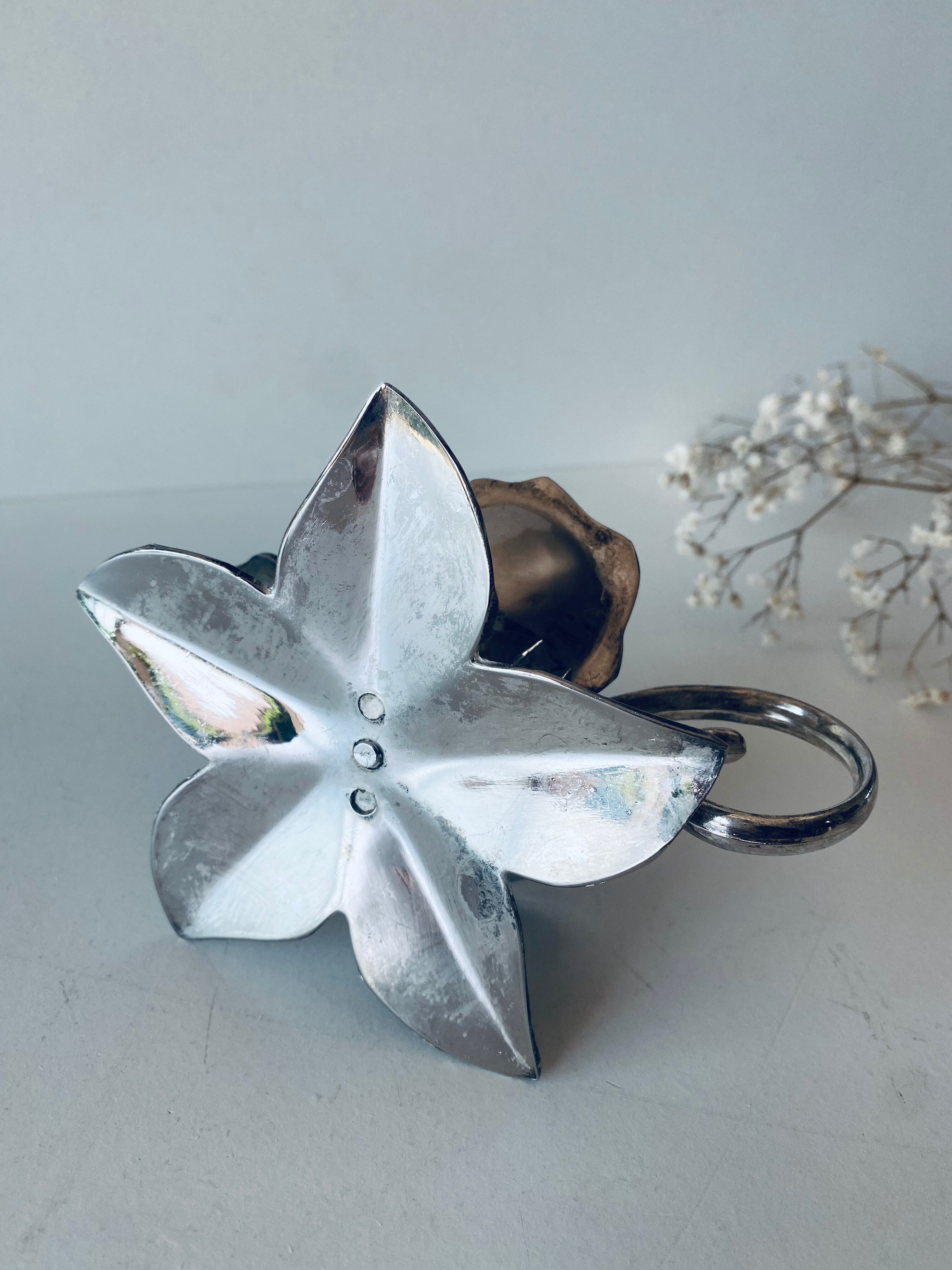 Silver flower candle holder