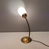 Beautiful table lamp, estimated from the 1950-60s. Made of metal, brass and glass.