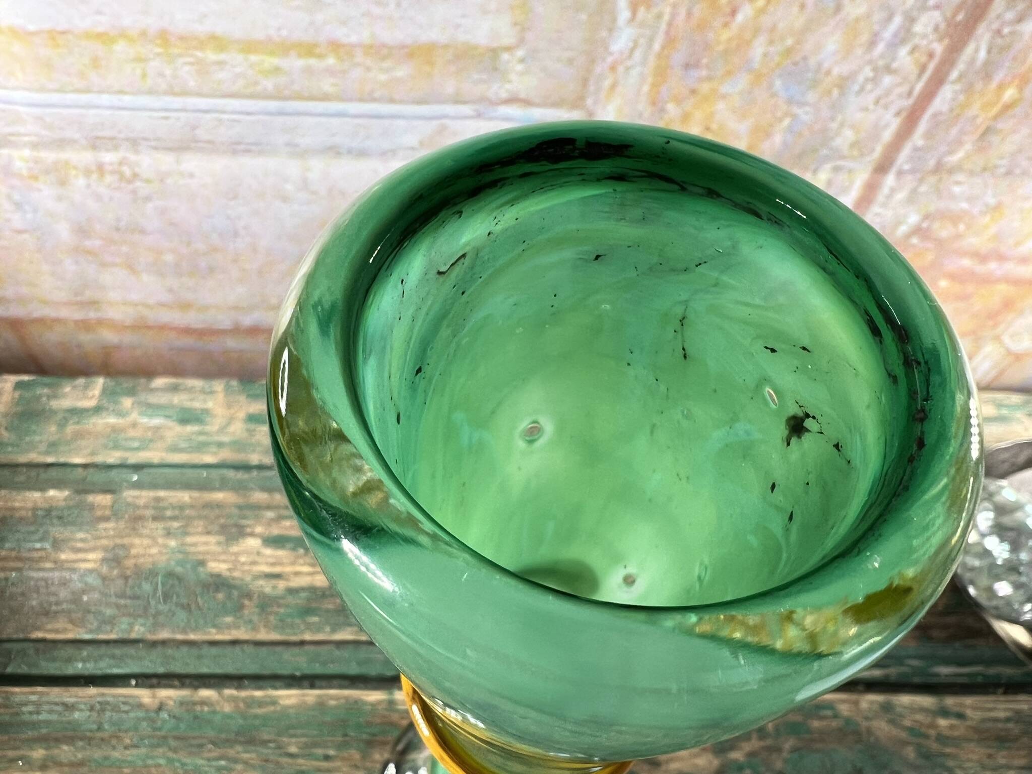 Blown glass vase by Guy Untrauer, signed and dated 1990.