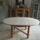 Round table with 1 extension oak base tray and patinated extension pearl gray.