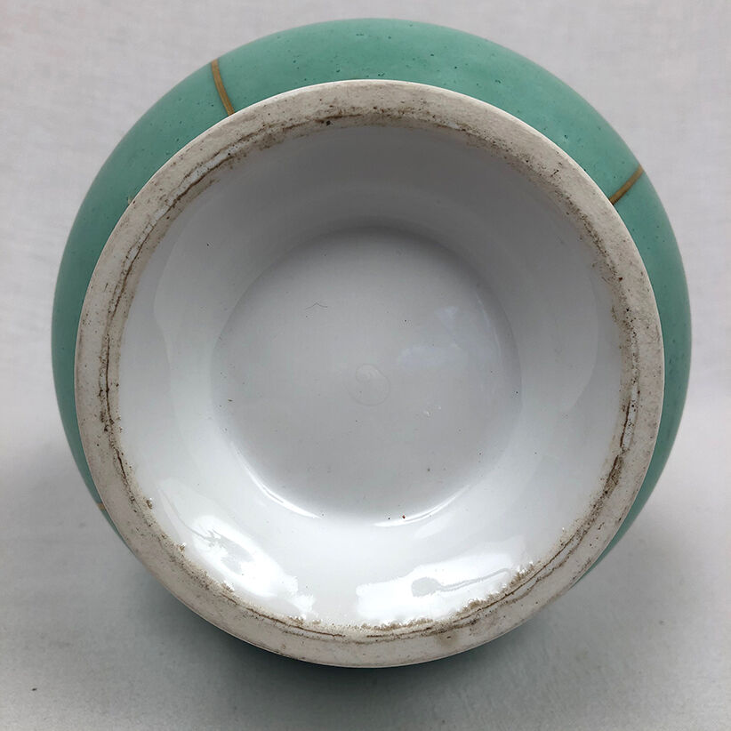 Ball vase with bent barrel in celadon green porcelain, nineteenth